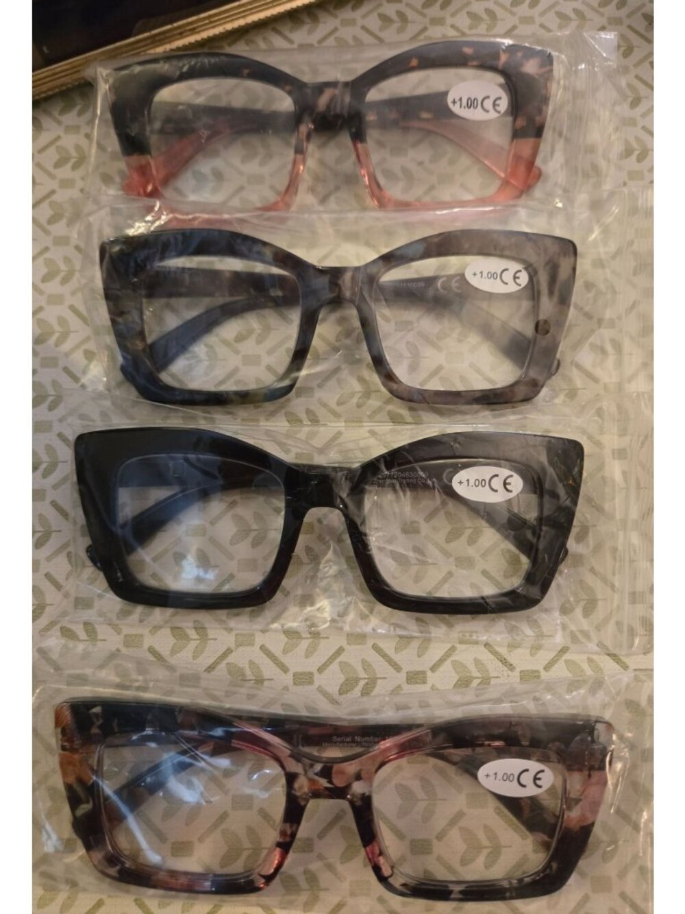#3001, 4 pair designer readers 1.00 strength